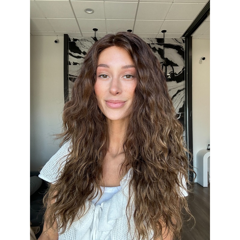 24″ Gisele Silk Top Wig Medium Brown Balayage w/ Butterfly Cut Wavy